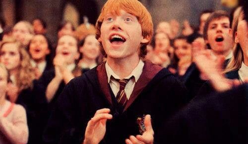 Ron Weasly from Harry Potter applauding in the Great Hall