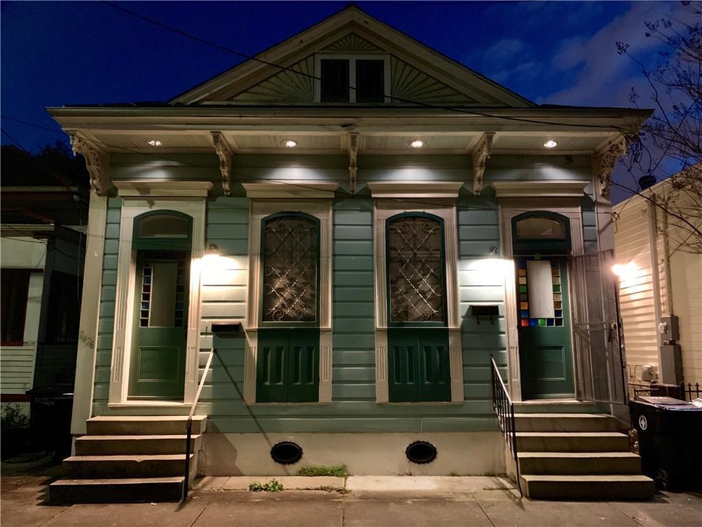 Double barrel shotgun home in New Orleans at night